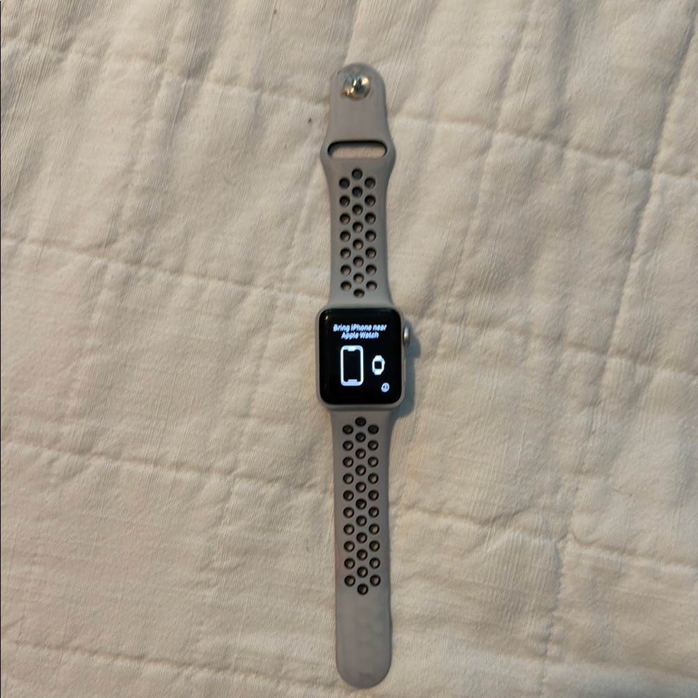 Apple Gray Smartwatch with Sporty Band and Digital Interface